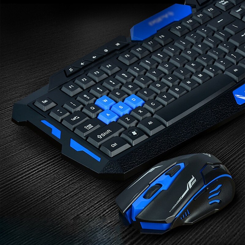 Gaming keyboard and mouse set with blue accents on a dark surface