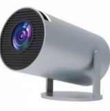 Small gray projector on a white background