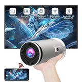 Hand holding a cylindrical device with screen displaying graphics and text on a white background