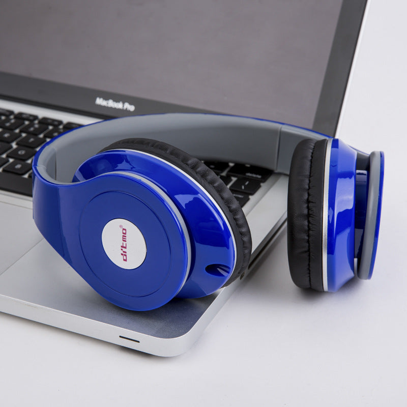Blue headphones on a laptop with a visible brand logo