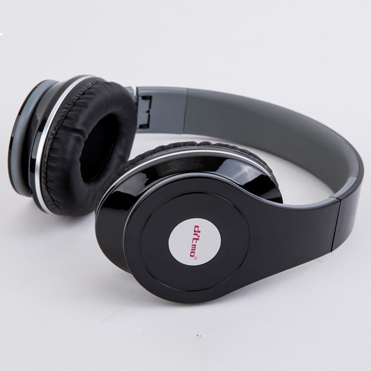 Black headphones with a visible brand logo on a white background