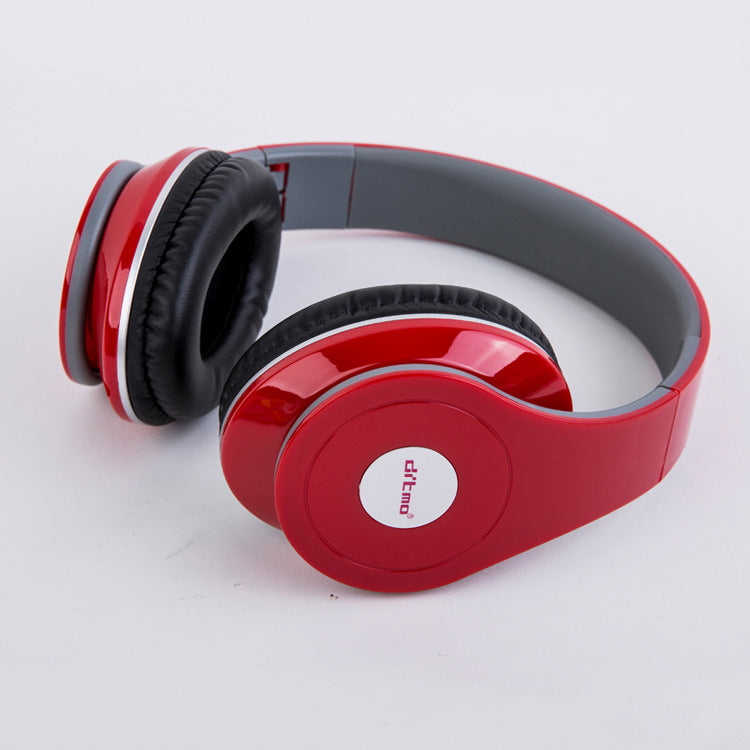 Red headphones with gray accents on a white background