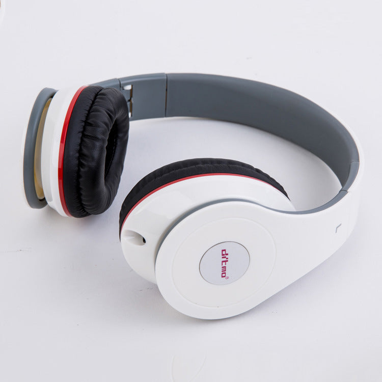 White and gray headphones with red accents on a white background