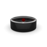 Black ring with a red dot and 'NE' logo on a white background