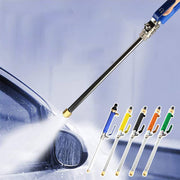 Car wash tool with extendable handle and color-coded nozzles, used on a car.