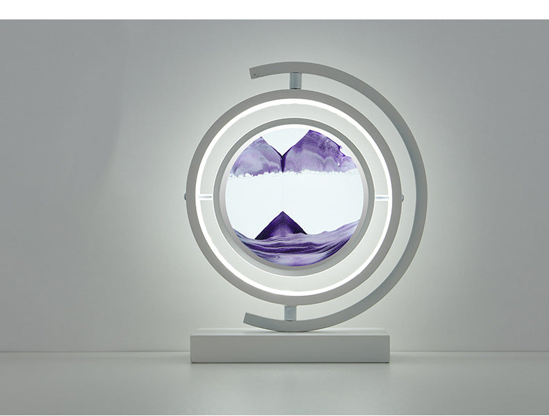 Decorative lamp with circular design and purple watercolor effect on a gray background