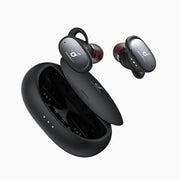 Black wireless earbuds with charging case on a white background