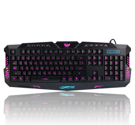 Gaming keyboard with purple backlighting on a white background