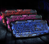 Gaming keyboards with colorful backlighting on a dark surface