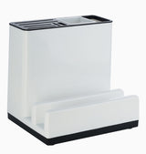 White kitchen utensil holder with black base on a white background