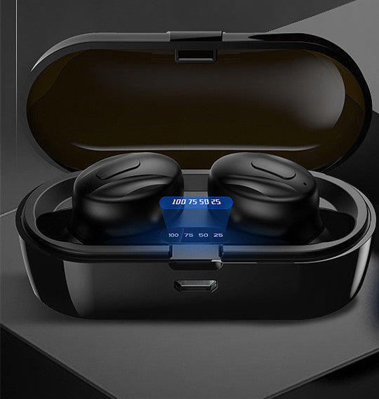 Black wireless earbuds in an open charging case on a dark background