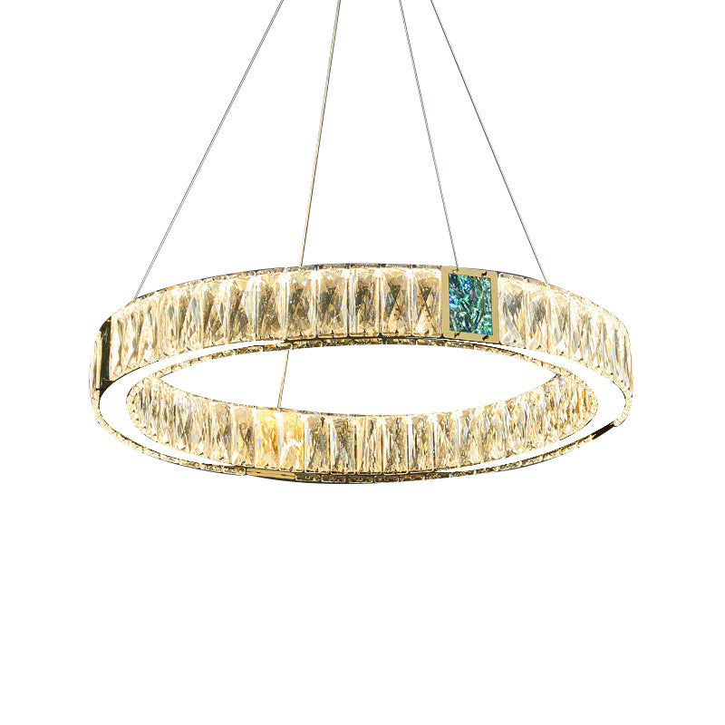 Modern chandelier with two circular designs on a white background