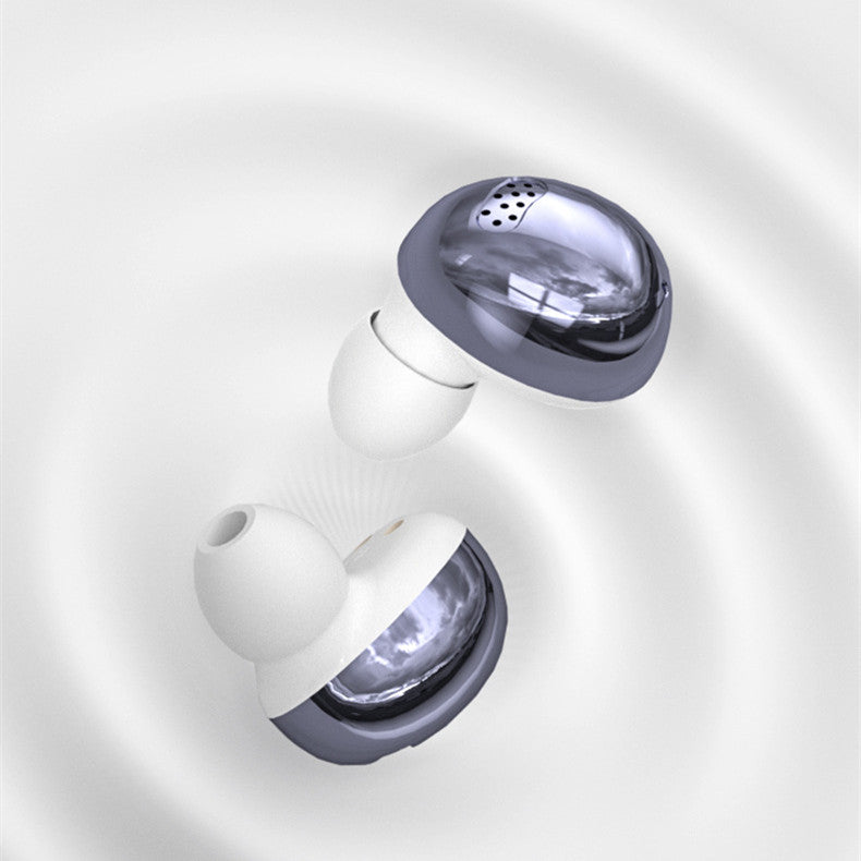 White earbuds with metallic accents on a light gray background