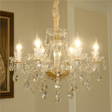 Crystal chandelier with multiple lights in a room setting