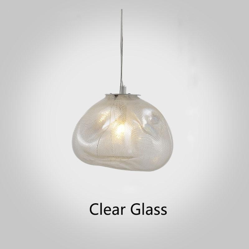 Clear glass pendant light on a gray background