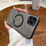 Person holding a gray phone case with a Starbucks cup in the background