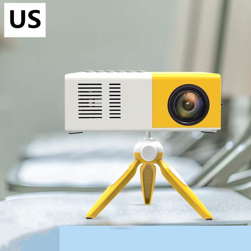 Yellow and white projector on a stand with a blurred background