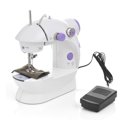 White sewing machine with purple accents on a white background