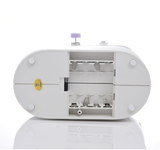 White sewing machine on a white background
