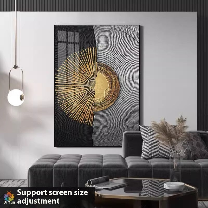 Abstract art piece on a wall above a gray sofa in a modern living room.