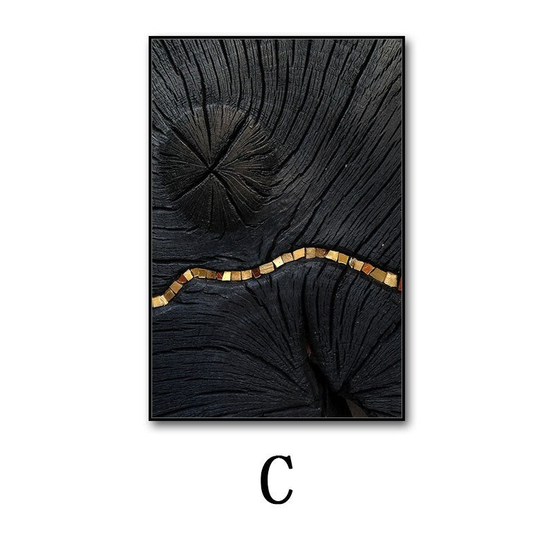 Abstract art piece with black and gold design on a white background