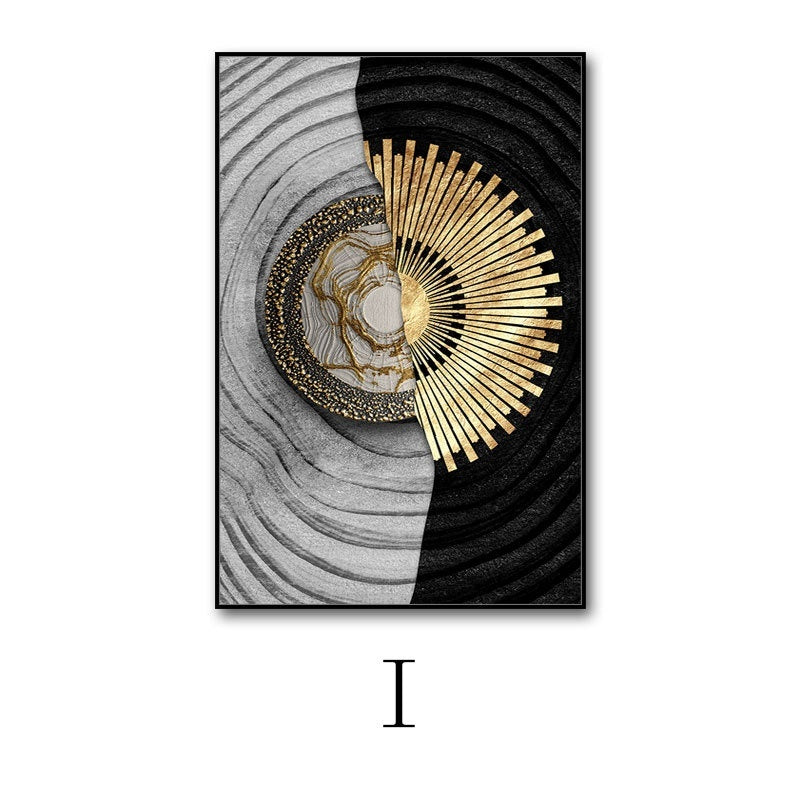 Decorative wall art with abstract design featuring gold, black, and gray colors on a white background.