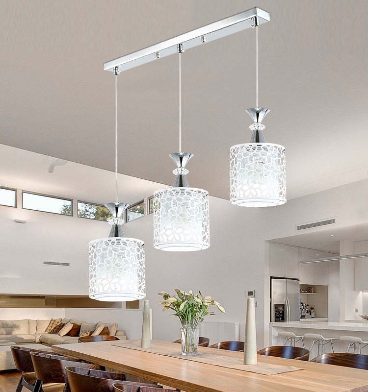 Modern pendant light fixture in a dining room setting