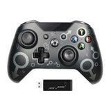 Gaming controller with USB receiver on a white background