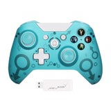 Turquoise gaming controller with USB adapter on a white background
