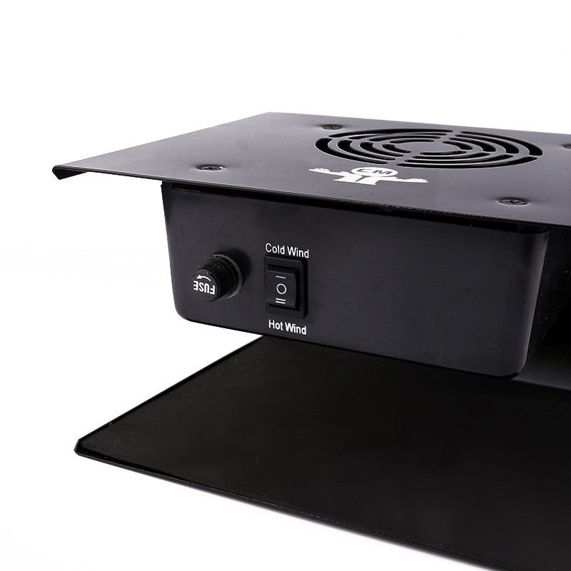 Black industrial fan with control switches on a white background