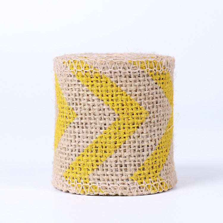 High-quality natural jute burlap ribbon roll with finished edges for rustic wedding decor, gift wrapping, and floral arrangements