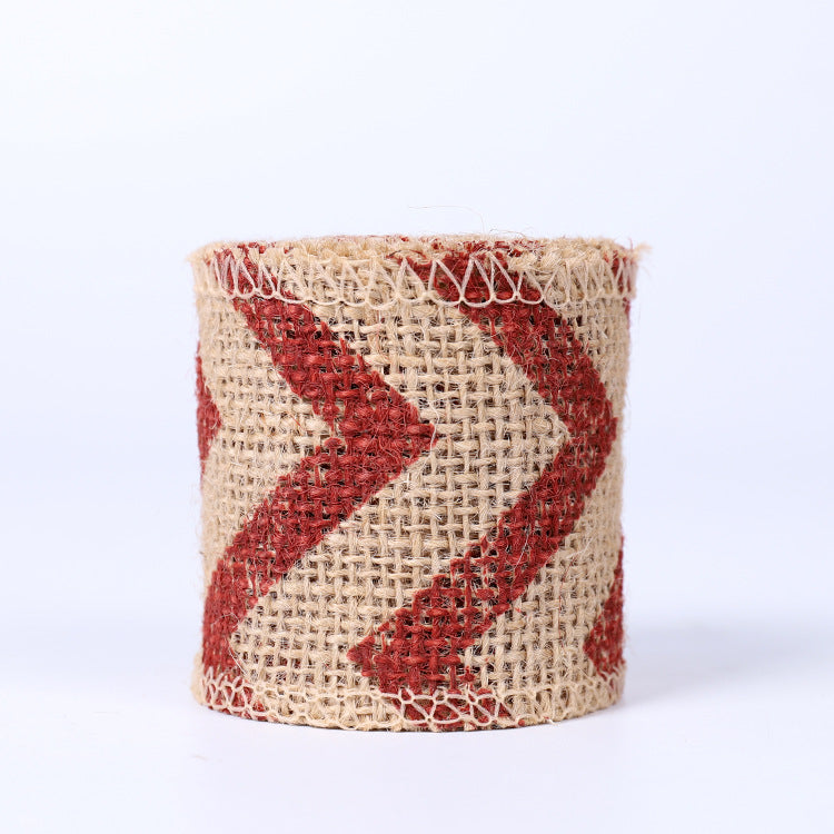 High-quality natural jute burlap ribbon roll with finished edges for rustic wedding decor, gift wrapping, and floral arrangements