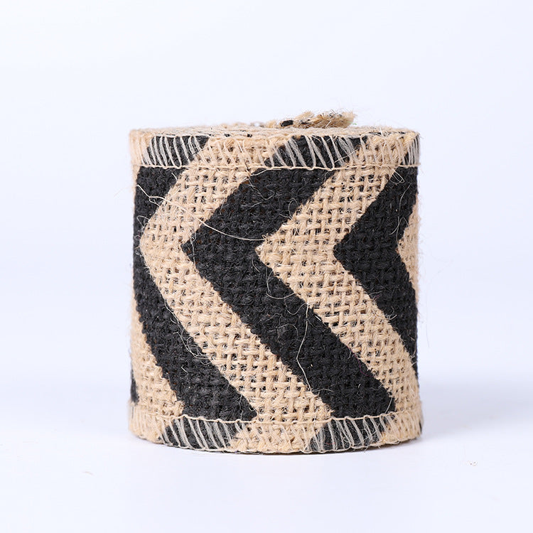 High-quality natural jute burlap ribbon roll with finished edges for rustic wedding decor, gift wrapping, and floral arrangements