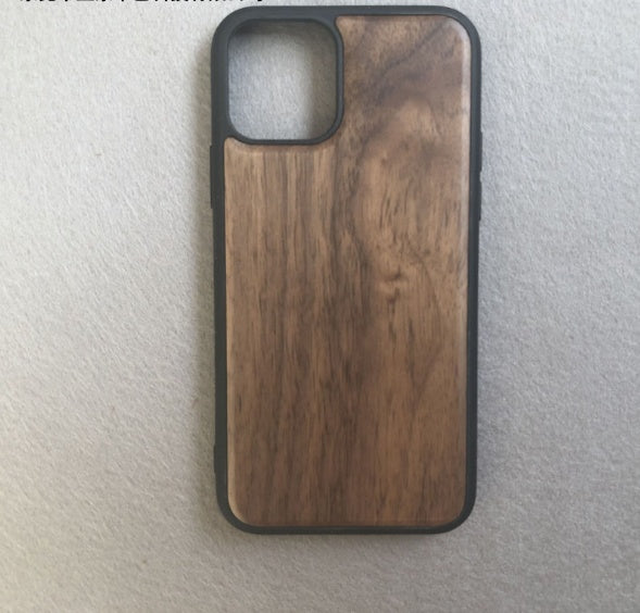 Wooden phone case with black border on a light gray background