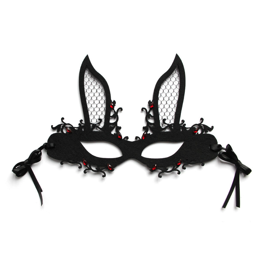 Black lace mask with red embellishments on a white background