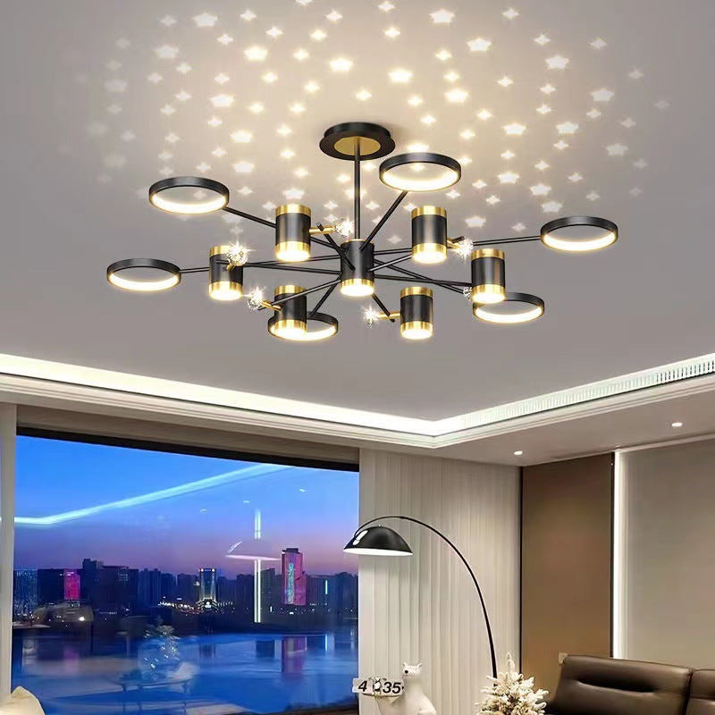 Modern chandelier in a room with a cityscape view