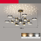 Modern chandelier with black and gold design on a gray background