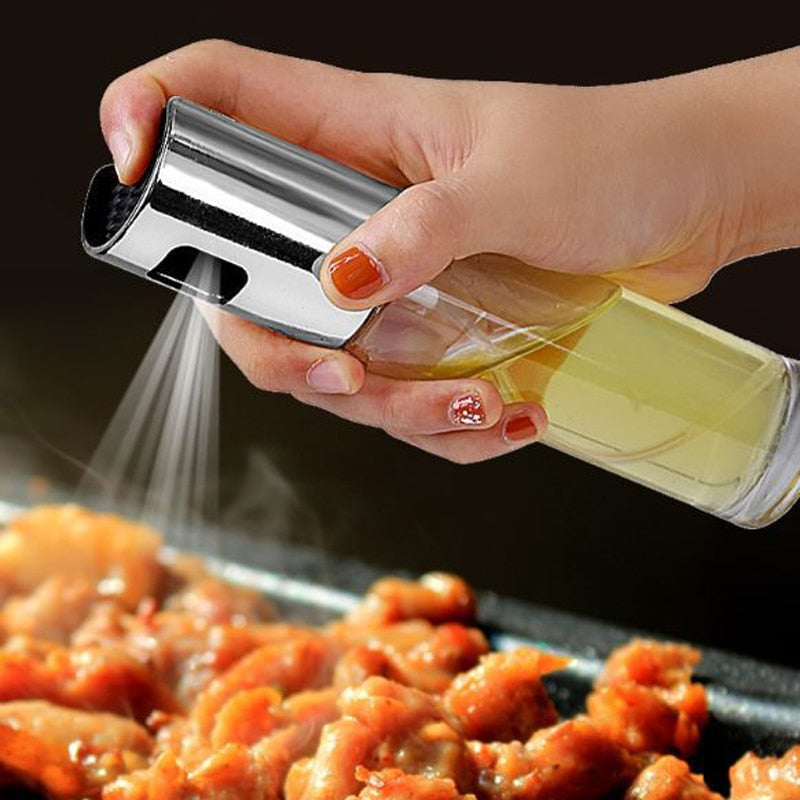 Hand holding a salt shaker over food being sprinkled with salt