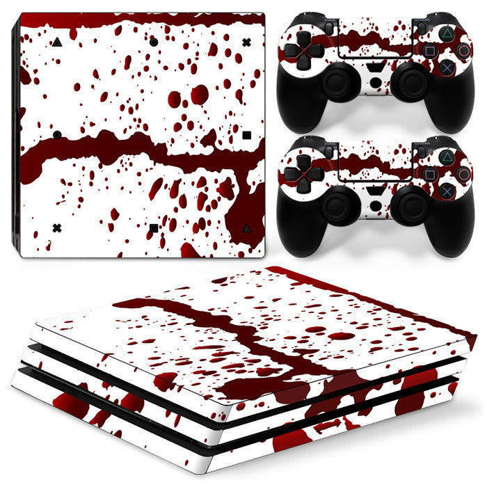Gaming console and controllers with red and white splatter design