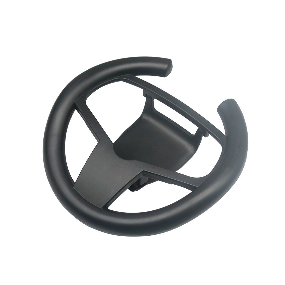 Black steering wheel attachment on a white background