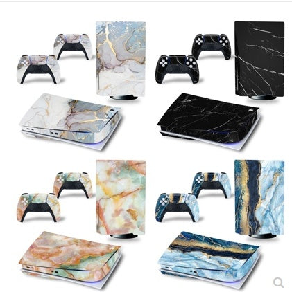 Gaming console and controller skins with marble and abstract designs on a white background