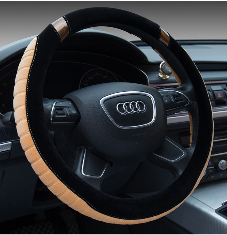 Steering wheel cover with Audi logo on a car steering wheel