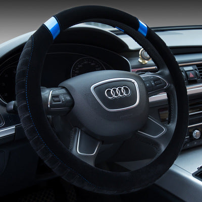 Steering wheel with Audi logo in a car interior