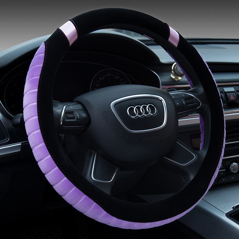 Steering wheel cover with purple trim on an Audi steering wheel