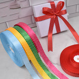 Handmade decorative bows featuring classic polka dot patterns on premium grosgrain ribbon for gift wrapping and accessories