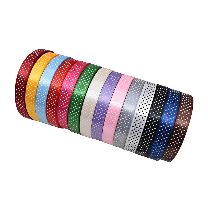 Handmade decorative bows featuring classic polka dot patterns on premium grosgrain ribbon for gift wrapping and accessories