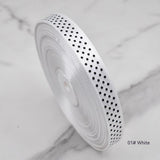Handmade decorative bows featuring classic polka dot patterns on premium grosgrain ribbon for gift wrapping and accessories