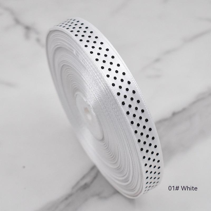 Handmade decorative bows featuring classic polka dot patterns on premium grosgrain ribbon for gift wrapping and accessories