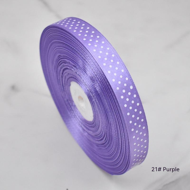 Handmade decorative bows featuring classic polka dot patterns on premium grosgrain ribbon for gift wrapping and accessories