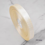 Handmade decorative bows featuring classic polka dot patterns on premium grosgrain ribbon for gift wrapping and accessories
